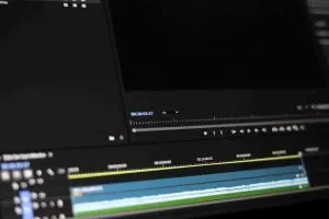 Video editing timeline open on a laptop screen